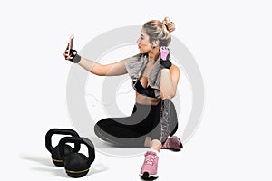 Strong woman posing with kettlebell