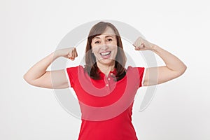 Strong woman showing her muscularity and looking at camera isolated on white. Copy space and blank shirt. Mother day