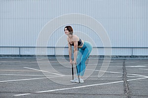 Strong woman using a resistance band in her exercise routine