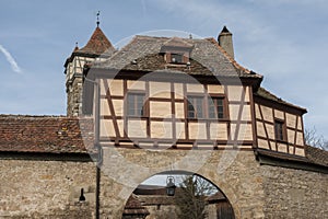 The stronghold gate in the medieval town Rothenburg ob der Tauber, one of the most beautiful and romantic villages in Germany