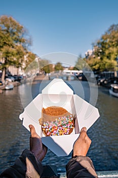 Stroopwafel in Amsterdam a typical Dutch food two circular pieces of waffle filled with caramel