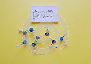 Structural chemical formula and molecular structure model of histamine molecule