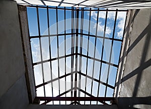 Structural steel beam on roof of building.