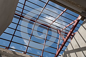 Structural steel beam on roof of building.