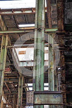 Structural Steel Beams: Green and Rusted