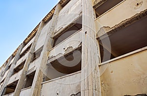 Structure of an abandoned unfinished concrete building.