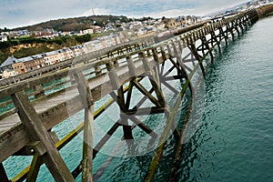 Structure of a high wooden pier in Fecamp, France photo