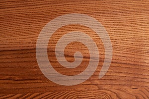 The structure of natural ash wood, tinted oak. Hardwood. Creative vintage background. Imitation of aging