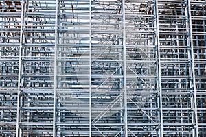 Structure of a new steel frame of a building on an industrial construction site