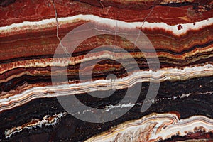 The structure of Onyx, a bright red color with thin veins, is called Onice Fantastico photo