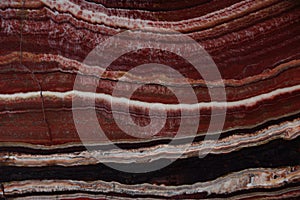 The structure of Onyx, a bright red color with thin veins and waves, is called Onice Fantastico photo