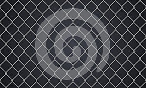 The structure of a realistic mesh fence. Seamless fence, isolated on a dark black background