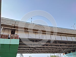 Structure of reinforced concrete bridge. Bottom view of concrete bridge. Concrete bridge engineering construction. Modern cement