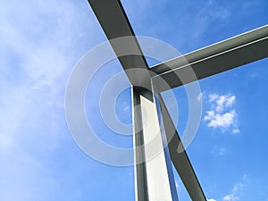 Structure of steel building construction with blue sky background