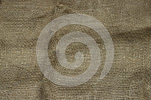 The structure of the threads of a natural burlap fabric