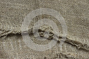 The structure of the threads of a natural burlap fabric
