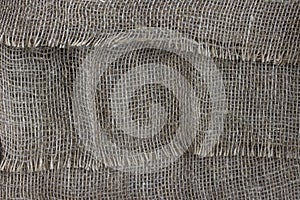 The structure of the threads of a natural burlap fabric