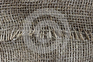 The structure of the threads of a natural burlap fabric