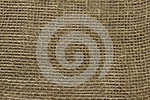 The structure of the threads of a natural burlap fabric