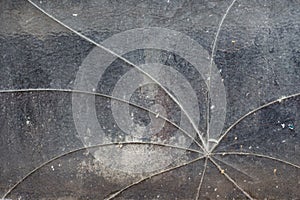 Structured glass with a hole and star like cracks for background