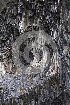 Structures of basalt lava cliffs in Gole dellâ Alcantara gorge close to Taormina, Sicily Italy