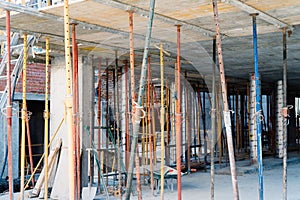 Struts in building structure under construction