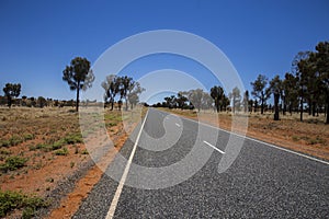 The stuart highway on the way to the Uluru or Ayers Rock.