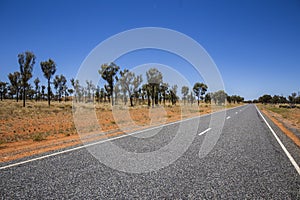 The stuart highway on the way to the Uluru or Ayers Rock.