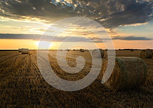 Stubble field and hay bales