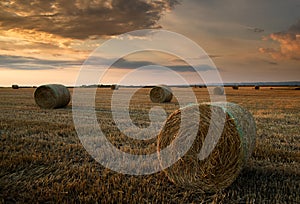 Stubble field and hay bales