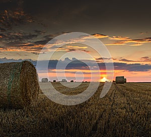 Stubble field and hay bales