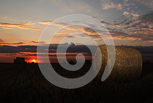 Stubble field and hay bales