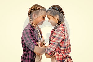 Stubborn concept. Stubborn kids. Disagreement and stubbornness. Girls offended friends. Kids sisters looks strictly photo