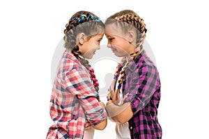 Stubborn concept. Stubborn kids. Disagreement and stubbornness. Girls offended friends. Kids sisters looks strictly photo