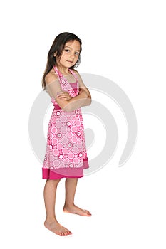 Stubborn looking girl standing with arms crossed
