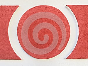 stucco circle or round frame textured wall background in red and white
