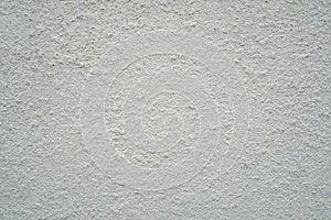 Stucco texture of cement wall, White painted and surface grunge rough of concrete wallpaper background.