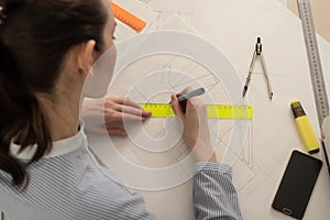 Student architect draws geometric shapes, design practice