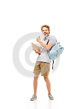 Student with backpack and notebook yeah