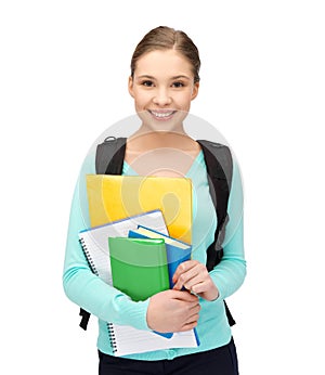 Student with books and schoolbag