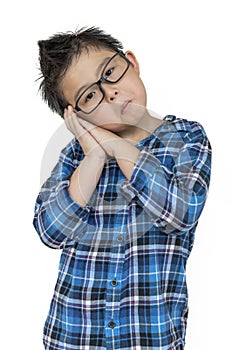 Student boy in glasses feels sleepy on isolated white background