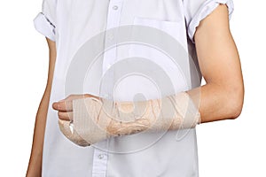 Student broken bone finger and arm in an accident isolated in white background.