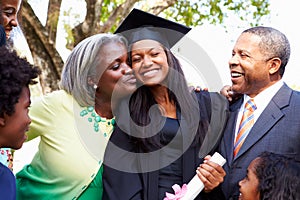 Student Celebrates Graduation With Parents