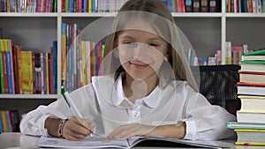 Student child writing studying in library learning school girl at desk office 4K