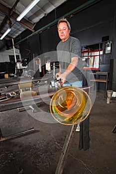 Student Cooling Off Glass Object