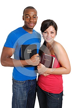 Student couple holding bibles