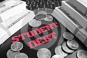Student Debt With Money On Laptop Keyboard High Quality Stock Photo