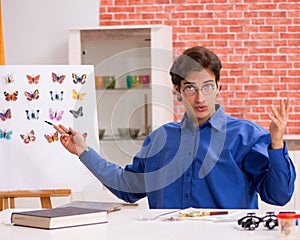 Student entomologist studying new species of butterflies