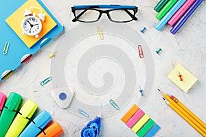 Student equipment on a gray textural background
