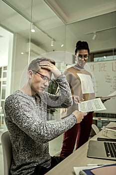 Student feeling shocked after seeing result of his finals photo